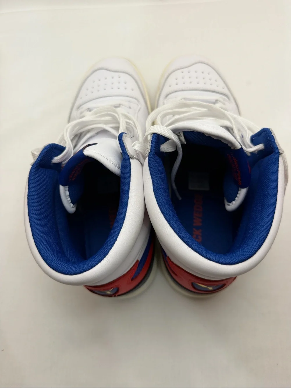 Puma Men's White High-Top Sneakers with Blue and Red Accents